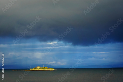 The island Munkholmen located in the Trondheim fjord near the norwegian city Trondheim, during amazing storm. photo