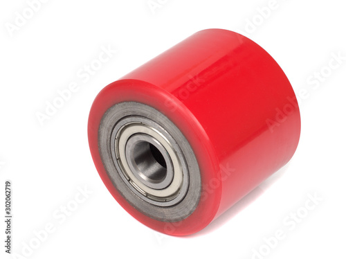An industrial roller for hoisting equipment made of red polyurethane isolated on a white