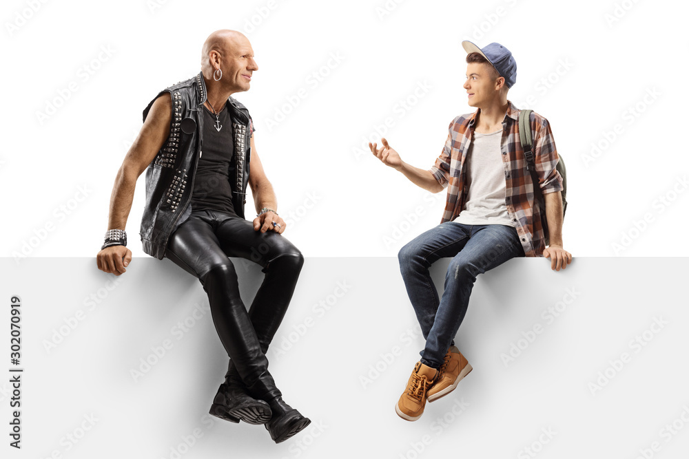 Hardcore punker and a male student talking and sitting on a panel Hardcore punker and a male student talking and sitting on a panel