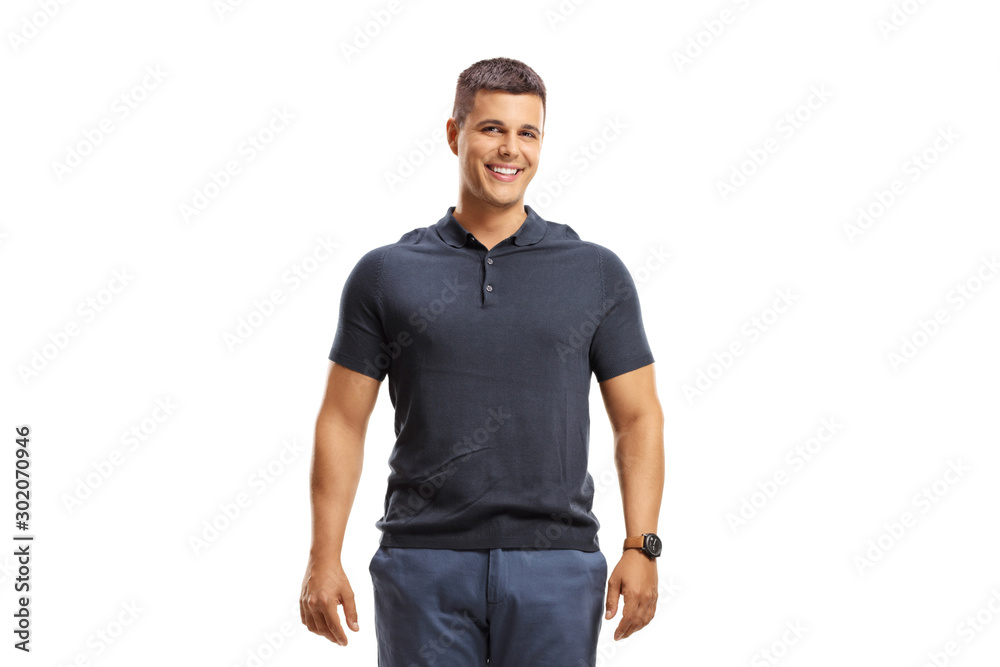 Handsome young man standing and looking at the camera Handsome young man standing and looking at the camera