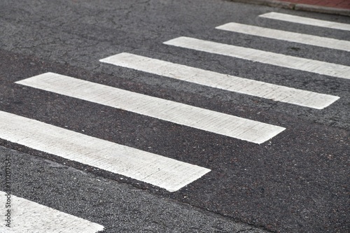 Crosswalk on the asphalt road. Road Safety