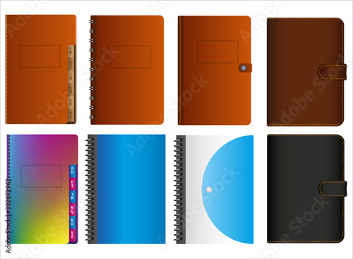 Set of isolated leather and plastic notebooks