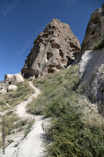 Uchisar, Turkey - 09/18/2009: Uchisar fortress carved into the rocks of Cappadocia.