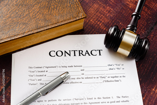 Legal contracts are subject to commercial disputes resolved in the courts of justice, contract with gavel.
