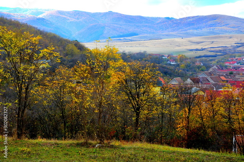 Fototapeta Naklejka Na Ścianę i Meble -  Typical rural landscape and peasant houses in Garbova, Transylvania, Romania. The settlement was founded by the Saxon colonists in the middle of the 12th century