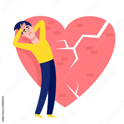 Upset man in blue and yellow clothes with broken heart.