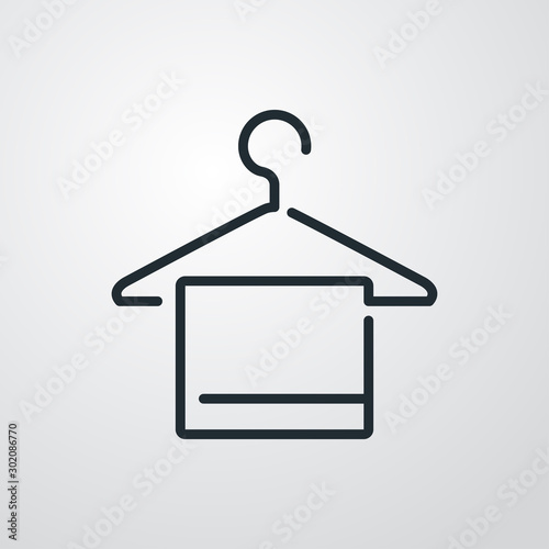 Icono plano lineal percha con tela en fondo gris