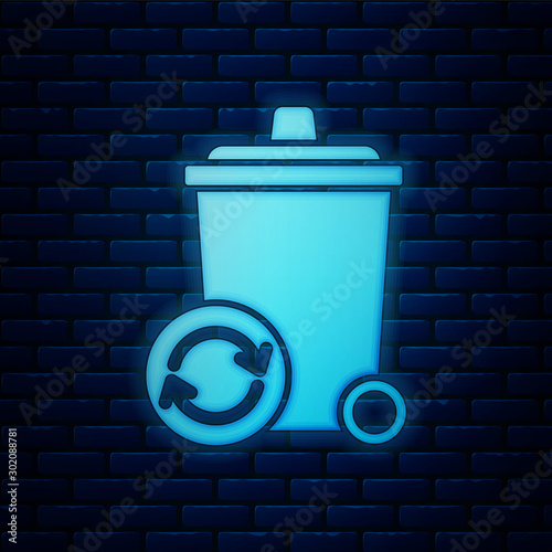 Glowing neon Recycle bin with recycle symbol icon isolated on brick wall background. Trash can icon. Garbage bin sign. Recycle basket sign. Vector Illustration