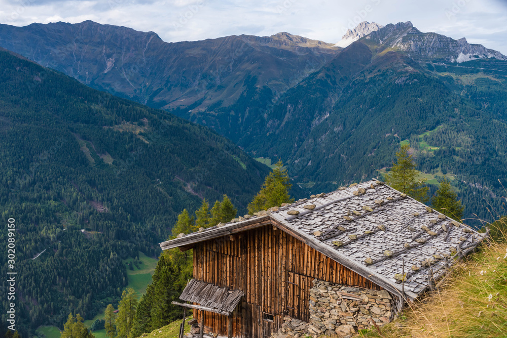 wooden hut in the alps, stubai valley, tyrol wooden hut in the alps, stubai valley, tyrol
