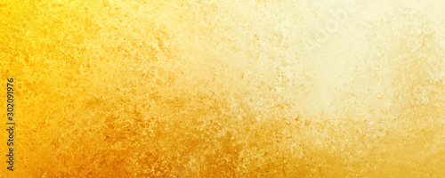 Yellow gold  background texture, old distressed vintage grunge in faded white spotlight design in upper corner and gradient hot bright color abstract textured design from dark to light