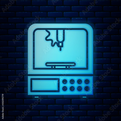 Glowing neon 3D printer icon isolated on brick wall background. Vector Illustration