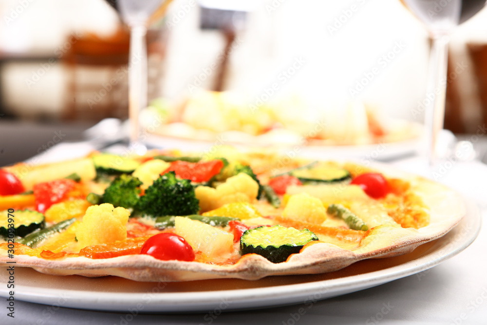Pizza with tomato, meat and ananas toppings Pizza with tomato, meat and ananas toppings