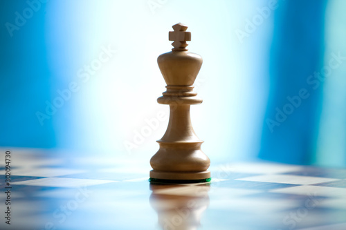 king on a chess board photo