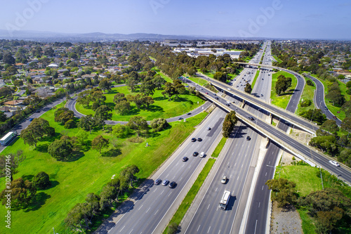 Cars driving on highway interchange in Melbourne, Australia photo