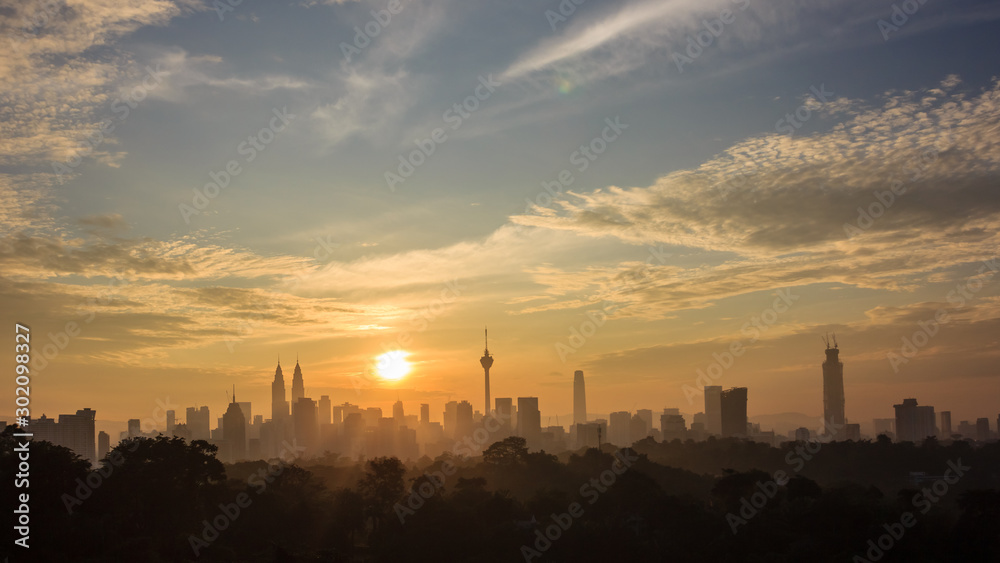 beautiful sunrise over kuala lumpur city skyline