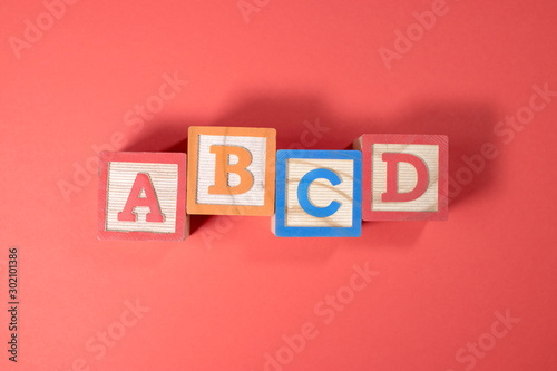 A, B, C and D wooden blocks