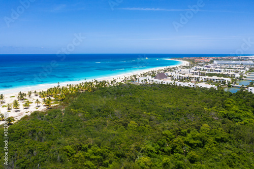 Caribbean beach of Atlantic ocean with luxury resorts, travel destination