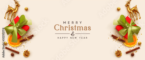 Merry Christmas and Happy New Year. Xmas composition realistic design elements, gift box, cinnamon, orange slice, chocolates, gold glass reindeer, metal deer. Holiday banner, poster, greeting card.
