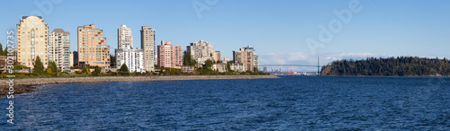 West Vancouver, British Columbia, Canada. Beautiful panoramic view of residential buildings on Pacific Ocean Coast during a sunny summer evening.