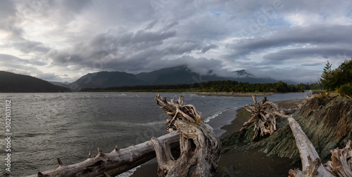 Port Renfrew  Vancouver Island  BC  Canada. Beautiful Panoramic View of a beach in a small town during a cloudy summer sunset.