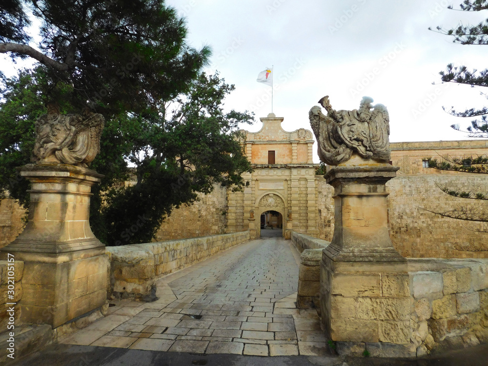 Mdina Gate and entrance bridge to fortified city of Mdina, Malta.