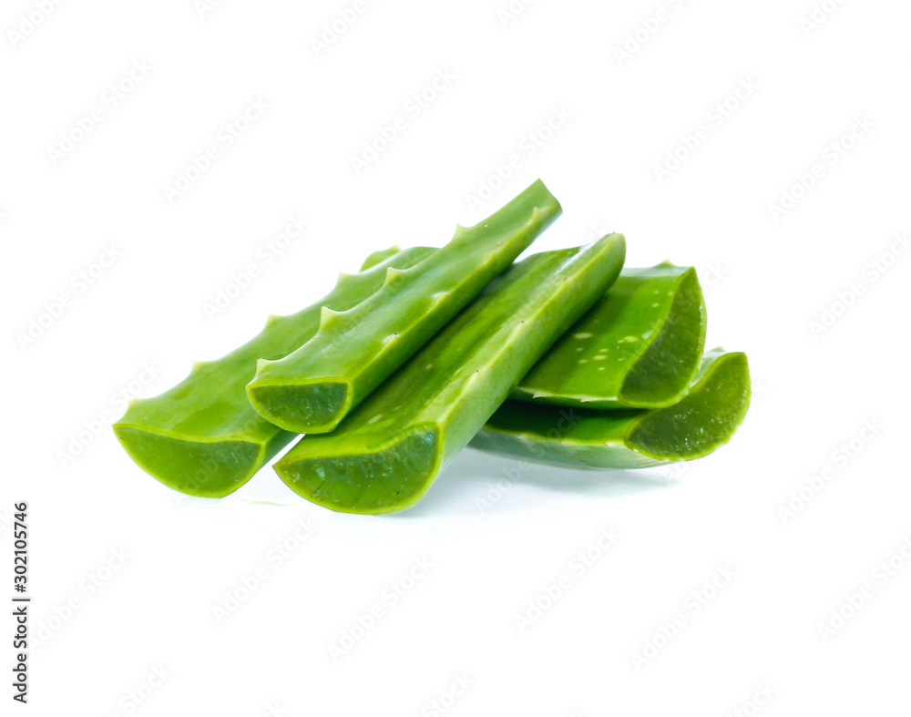 Fresh aloe vera leaves with water drops isolated on white Fresh aloe vera leaves with water drops isolated on white