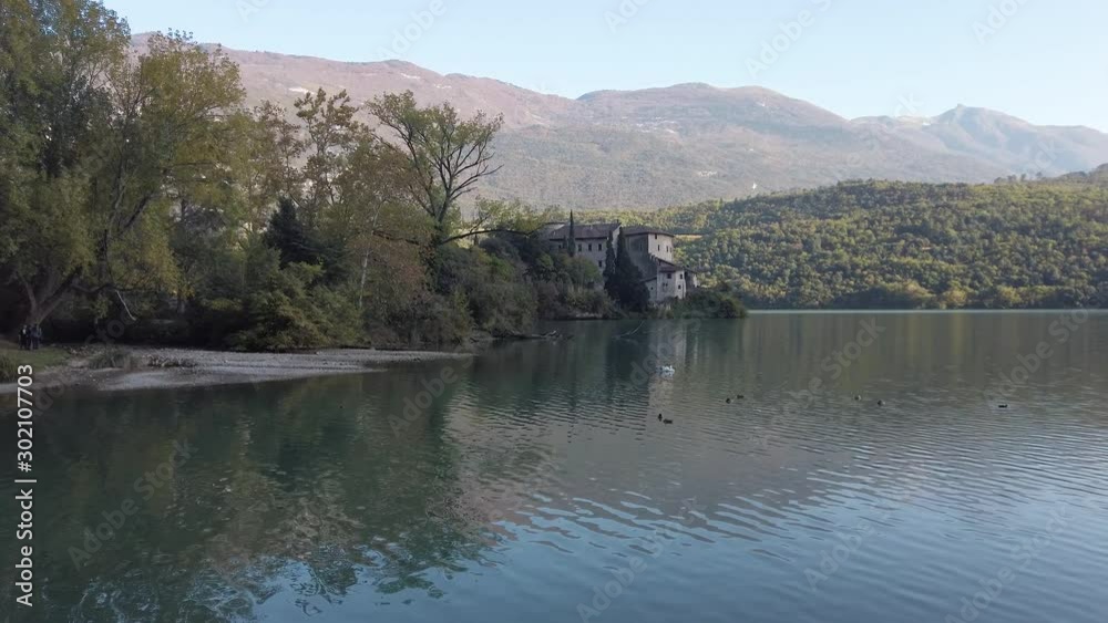 Lake and Castel Toblino, idyllic location in the Province of Trento, Trentino Alto Adige, northern Italy. Lake and Castel Toblino, idyllic location in the Province of Trento, Trentino Alto Adige, northern Italy.