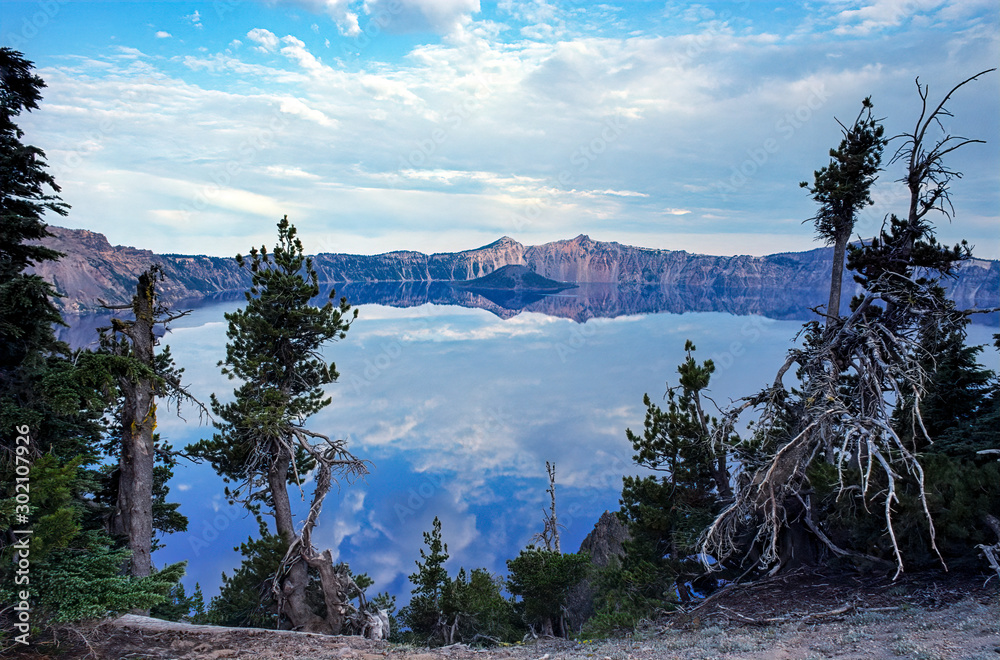 Fototapeta premium Clouds Reflect in Glassy Crater Lake