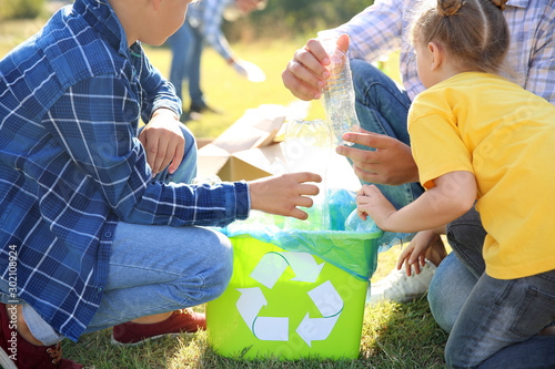 People gathering garbage ou...