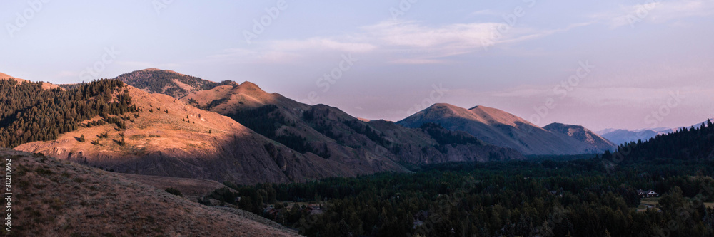panoramic view of mountains at sunset