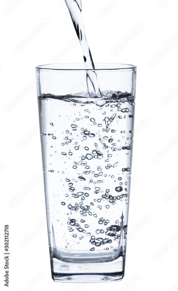 pouring water on a glass on white background clipping path pouring water on a glass on white background clipping path
