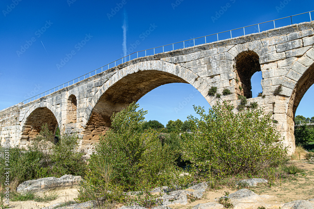Antique roman bridge made with stones, Europe