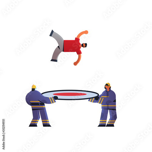 brave firemen holding trampoline life safe net catching falling down man firefighters team in uniform and helmet firefighting emergency service concept flat white background full length vector