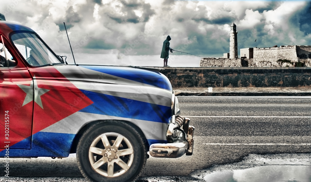 Fototapeta car with cuban flag road in streets of habana, Cuba 