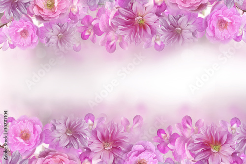 beautiful mix of roses orchid and dahlia flower frame in pink background with copy space 