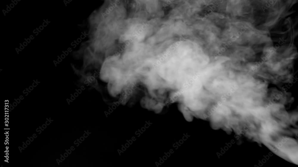 White smoke floating on isolated black background,water spray steam slow motion, Spooky element for halloween day White smoke floating on isolated black background,water spray steam slow motion, Spooky element for halloween day