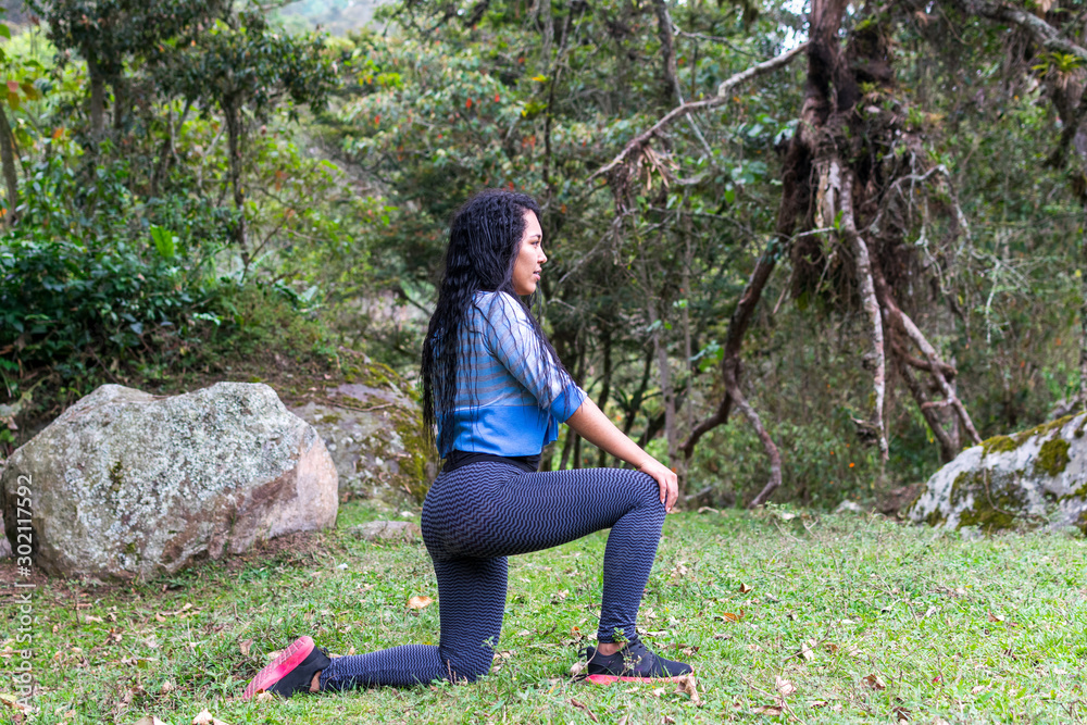 Woman exercising in the field Woman exercising in the field