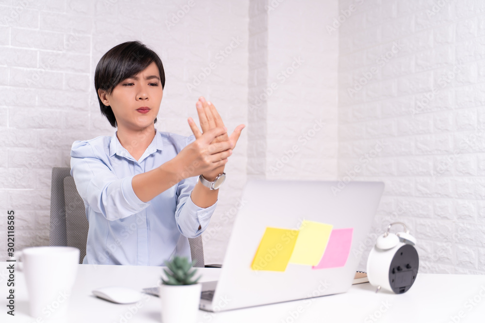Woman has body pain at office: Office syndrome concept Woman has body pain at office: Office syndrome concept