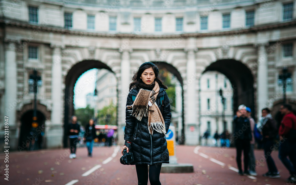 Asian model walking on London street