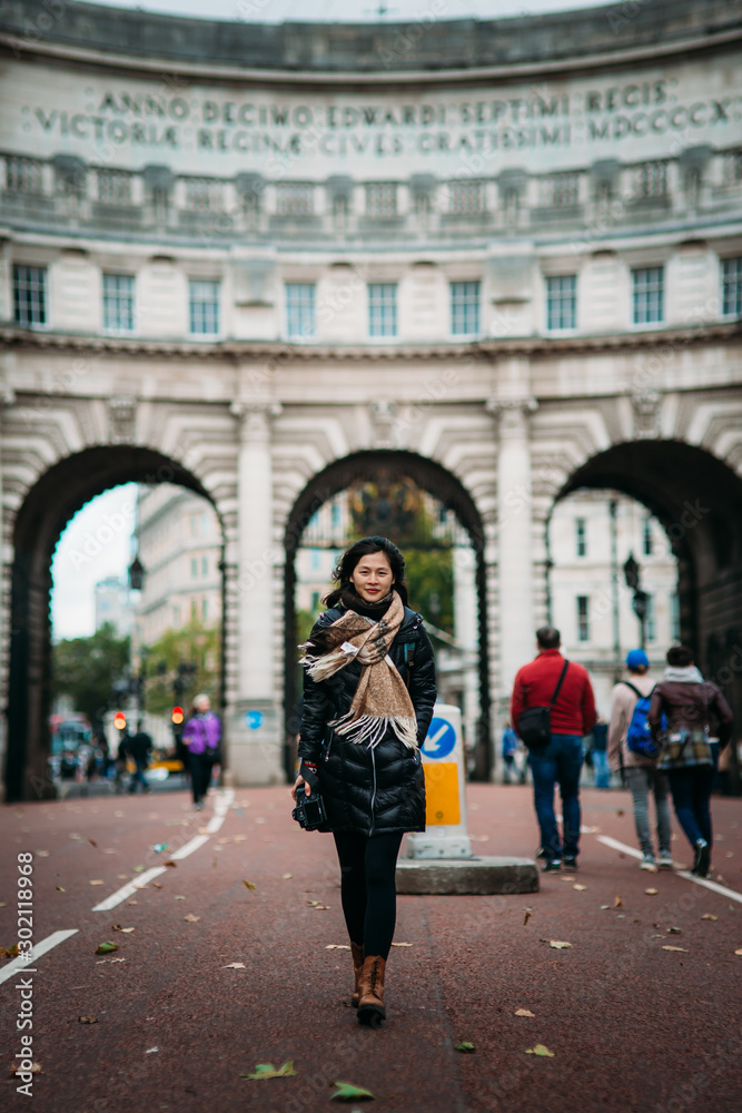 Asian model walking on London street