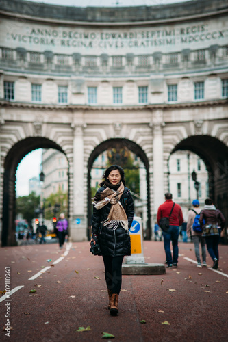 Asian model walking on London street