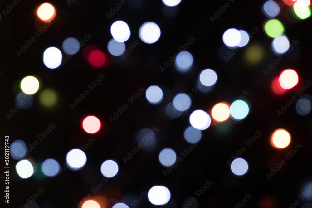 Fototapeta premium Abstract Defocused Lights on black Background,Bokeh background.