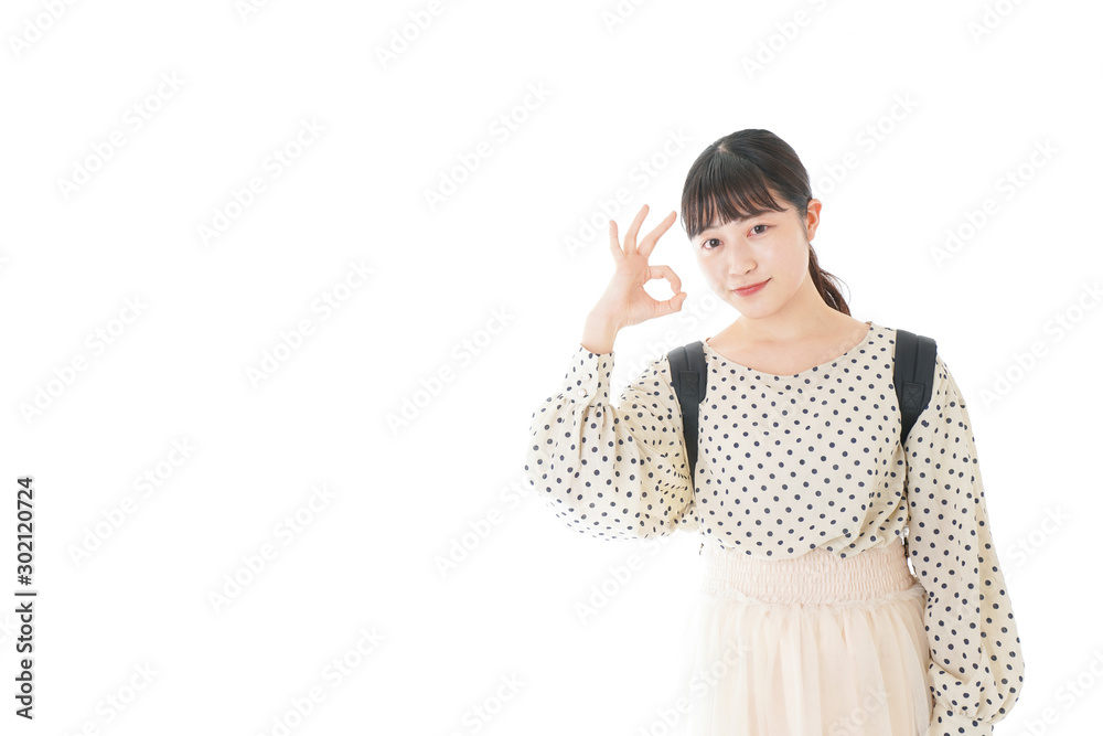 グッドサインをする笑顔の女子学生