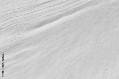 Snow on the frozen surface of the river, a natural background, Ob reservoir, Siberia