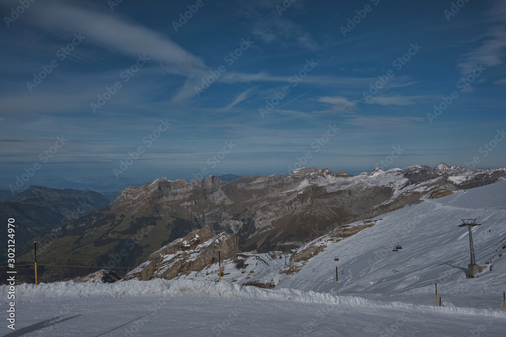 View from Mt. Titlis in Switzerland in winter. The Titlis is a mountain, located on the border between the Swiss cantons of Obwalden and Bern
