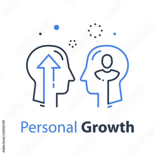 Two human head profiles, self improvement, leadership training or mentoring