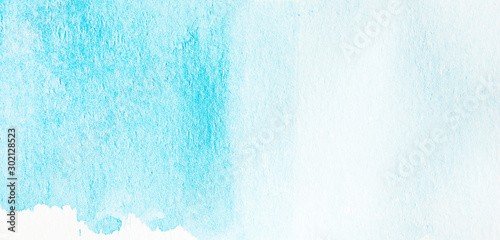 Abstract strokes of blue watercolor paint for the background