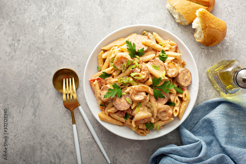 Cuadro en lienzo Cajun shrimp and sausage penne pasta in a bowl