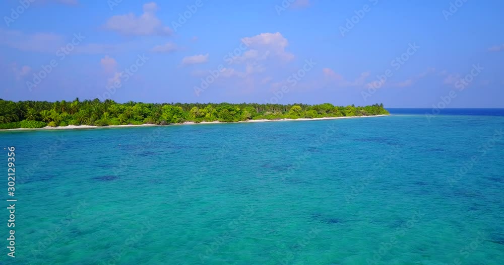 A Wonderful View of Cuba Island Surrounded by Bright Blue Ocean, Green Trees and Cloudly Sky- Wide Shot A Wonderful View of Cuba Island Surrounded by Bright Blue Ocean, Green Trees and Cloudly Sky- Wide Shot