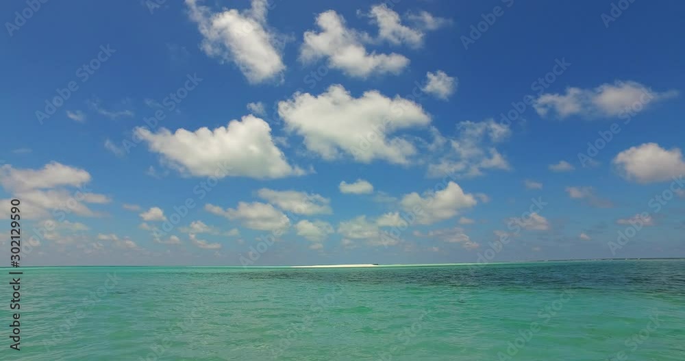 Spectacular Turquoise Clean Water With Cloudy Blue Sky in Hawaii - Wide shot Spectacular Turquoise Clean Water With Cloudy Blue Sky in Hawaii - Wide shot